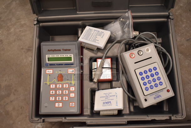 4 Items in Hard Gray Cases; 3 Multi-Sounds Trainer w/ Multi Sounds External Speaker and 1 Arrhythmia Trainer w/ Interaction Trainer. 4 Times Your Bid! (front room) - Image 5 of 8