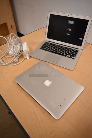 2 Apple A1466 13" MacBook Pro Laptops. 2 Times Your Bid! (front room)