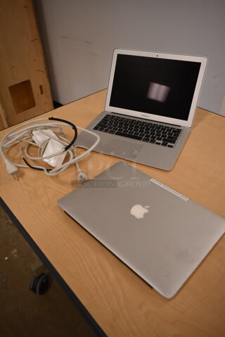 2 Apple A1466 13"  MacBook Pro Laptops. 2 Times Your Bid! (front room)