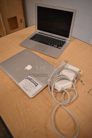 2 Apple A1466 13" MacBook Pro Laptops. 2 Times Your Bid! (front room)