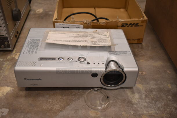 Panasonic PT-LB30U LB30 XGA LCD Projector w/ Remote. 100-240 Volts, 1 Phase. (front room) - Image 1 of 5