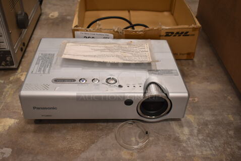 Panasonic PT-LB30U LB30 XGA LCD Projector w/ Remote. 100-240 Volts, 1 Phase. (front room)
