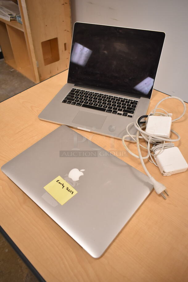 2 Apple A1398 15" MacBook Pro Laptops. 2 Times Your Bid! (front room) - Image 1 of 11