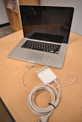 Apple A1286 15" MacBook Pro Laptop. (front room)