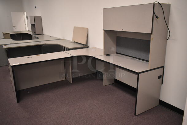 Gray L Shaped Desk w/ Overhead Cabinet. BUYER MUST REMOVE: Bring Tools and Manpower Needed To Remove This Item. (back room) - Image 1 of 6