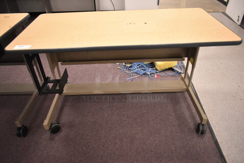Wood Pattern Desk on Casters. (back room)