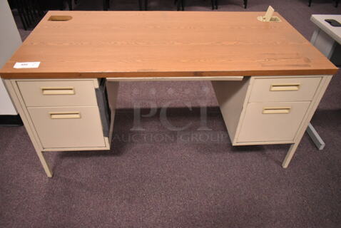 Tan Metal Desk w/ Wood Pattern Desk Top and 4 Drawers. (back room)