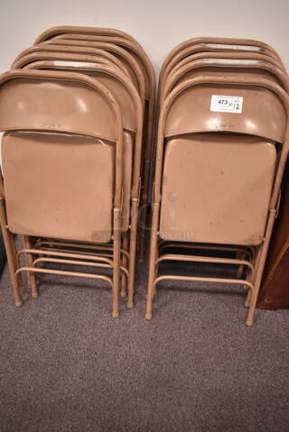 12 Metal Folding Chairs. 12 Times Your Bid! (front room)