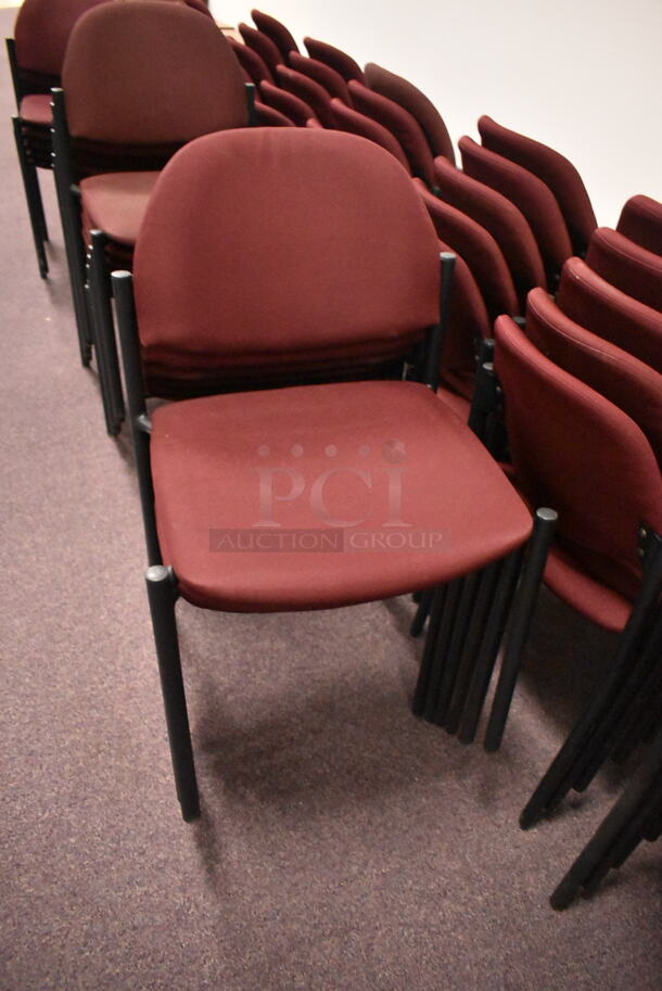 48 Stackable Maroon Chairs on Black Metal Legs. 48 Times Your Bid! BUYER MUST REMOVE: Bring Tools and Manpower Needed To Remove This Item. (back room) - Image 2 of 6
