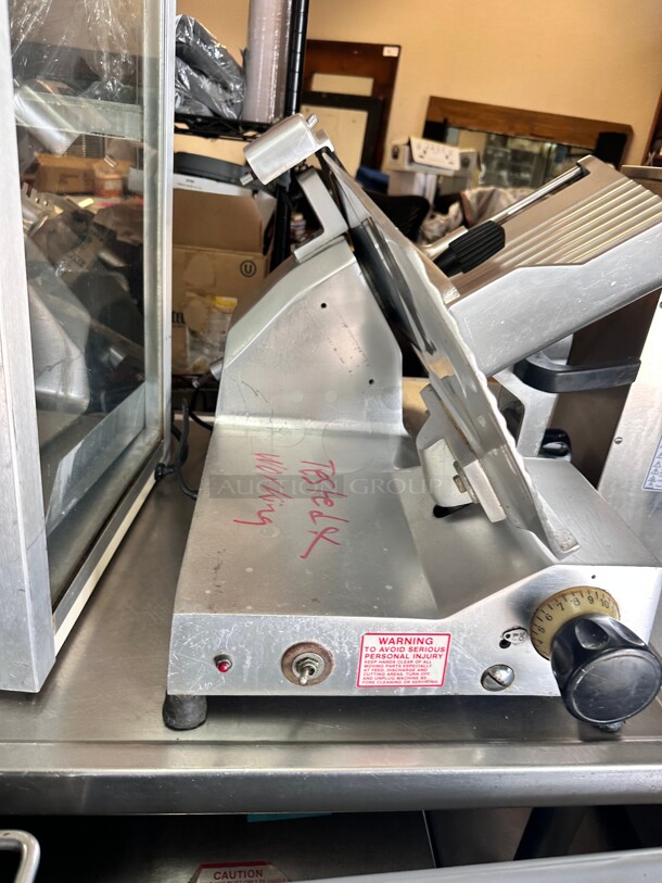 Berkel B12-SLC 12 inch Medium-Duty Gravity Feed Manual Meat Slicer - 1/2 hp Working - Image 5 of 10