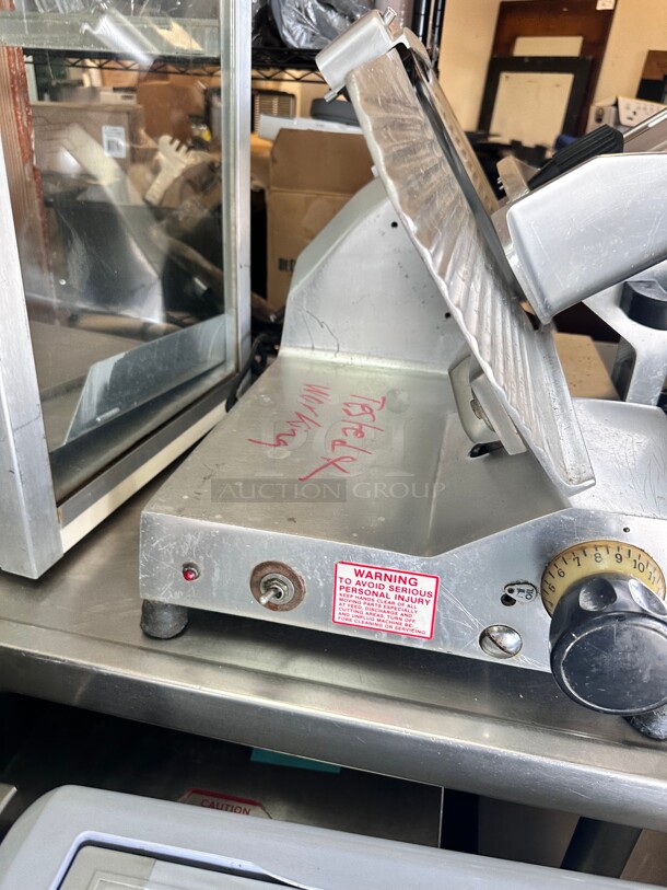 Berkel B12-SLC 12 inch Medium-Duty Gravity Feed Manual Meat Slicer - 1/2 hp Working - Image 6 of 10