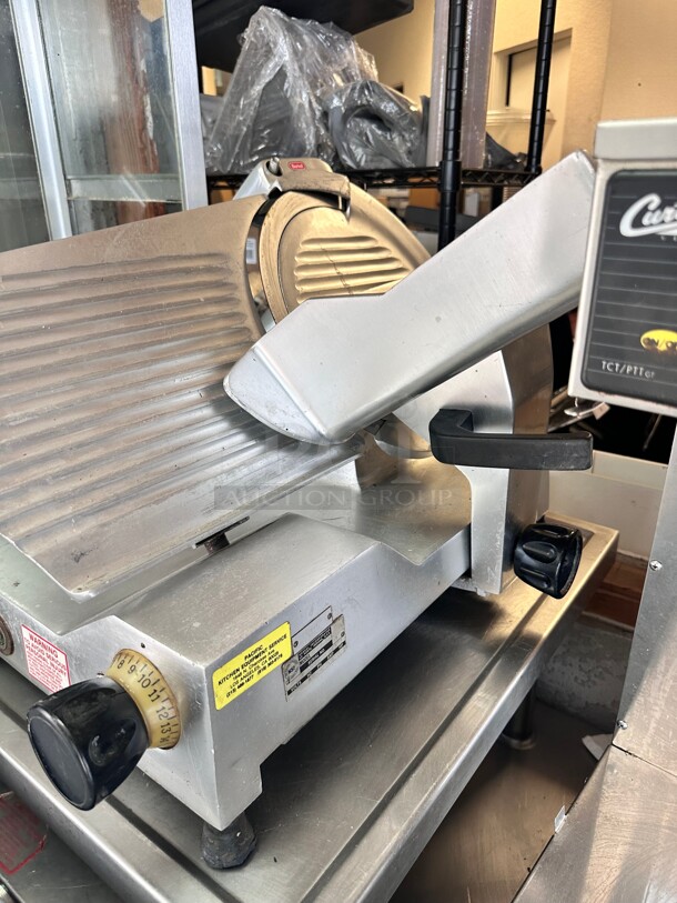 Berkel B12-SLC 12 inch Medium-Duty Gravity Feed Manual Meat Slicer - 1/2 hp Working - Image 8 of 10