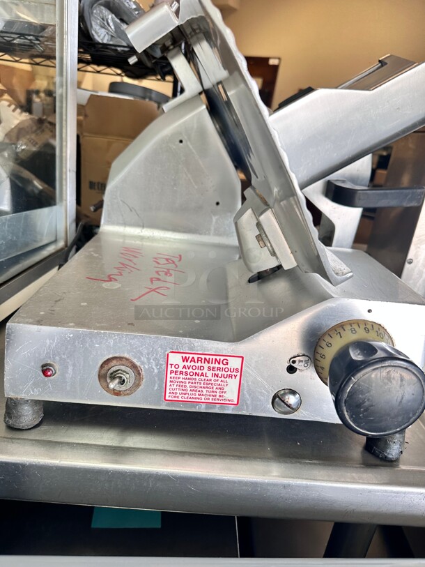 Berkel B12-SLC 12 inch Medium-Duty Gravity Feed Manual Meat Slicer - 1/2 hp Working - Image 9 of 10