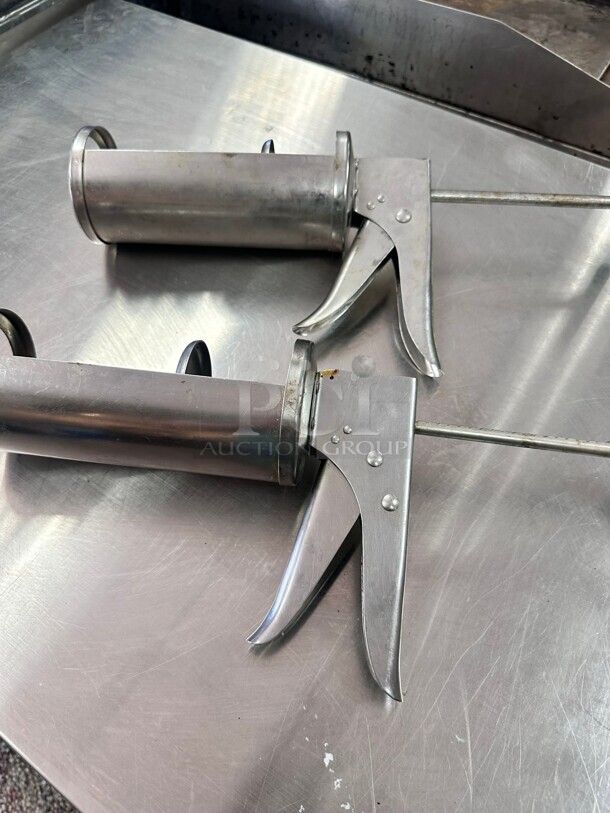 Choice 1/2, 1/3, and 2/3 oz. Adjustable Stainless Steel Sauce Gun / Dispenser - Image 1 of 7