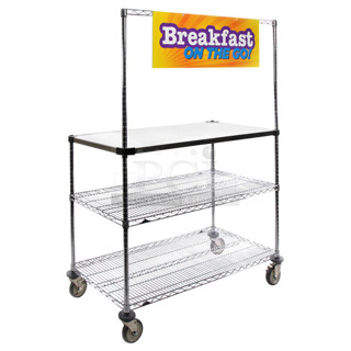 BRAND NEW SCRATCH AND DENT! Metro GG2448 24" x 48" Stainless Steel Workstation and Serving Cart with "Breakfast On the Go" Sign. May Be Missing Pieces.