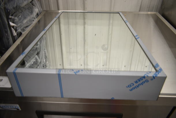 BRAND NEW SCRATCH AND DENT! American Specialties, Inc. 96105352436 24" x 36" Fixed Tilt Plate Glass Mirror with Stainless Steel Frame - Image 4 of 4