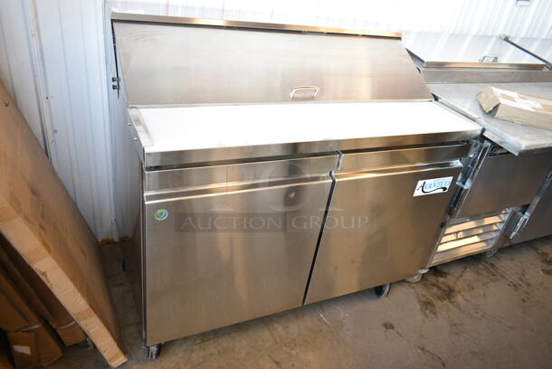 BRAND NEW SCRATCH AND DENT! 2023 Avantco 447APST48 Stainless Steel Commercial 48" 2 Door Stainless Steel Refrigerated Sandwich / Salad Prep Table on Commercial Casters. 115 Volts, 1 Phase. Tested and Working! - Image 2 of 7