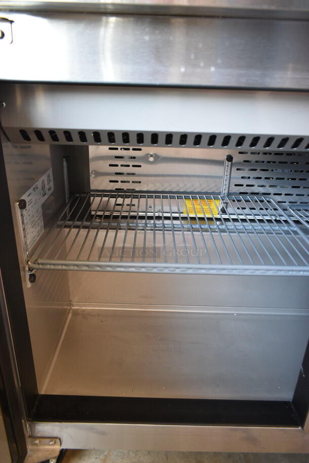 BRAND NEW SCRATCH AND DENT! 2023 Avantco 447APST48 Stainless Steel Commercial 48" 2 Door Stainless Steel Refrigerated Sandwich / Salad Prep Table on Commercial Casters. 115 Volts, 1 Phase. Tested and Working! - Image 5 of 7