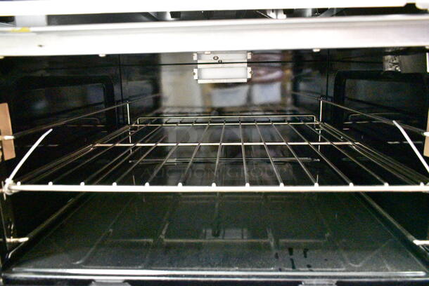 BRAND NEW SCRATCH AND DENT! 2023 Garland G60-4G36RR Stainless Steel Commercial Natural Gas Powered 4 Burner 60" Range with 36" Griddle and 2 Standard Ovens, Over Shelf and Back Splash. 262,000 BTU - Image 5 of 8