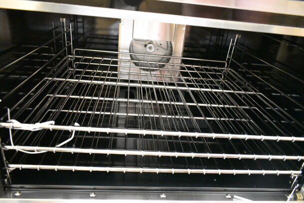 BRAND NEW SCRATCH AND DENT! Imperial 974IR6CNG Stainless Steel Commercial Natural Gas Powered 6 Burner Range w/ CONVECTION Oven and Over Shelf. No Back Splash.  - Image 7 of 9