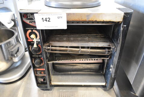 APW Wyott XTRM-2 Stainless Steel Commercial Countertop Electric Powered Conveyor Oven. 208 Volts, 1 Phase. 