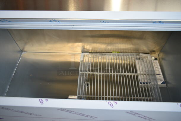 BRAND NEW SCRATCH AND DENT! Beverage Air SM58HC-W Stainless Steel Commercial 58" White 1-Sided Cold Wall Milk Cooler on Commercial Casters. 115 Volts, 1 Phase. Tested and Working! - Image 4 of 10