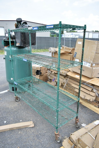 Green Finish 4 Tier Wire Shelving Unit on Commercial Casters. BUYER MUST DISMANTLE. PCI CANNOT DISMANTLE FOR SHIPPING. PLEASE CONSIDER FREIGHT CHARGES.