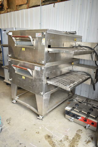 2 2017 XLT 3240B-EL-S4173 Stainless Steel Commercial Electric Powered Conveyor Pizza Ovens on Commercial Casters. 480 Volts, 3 Phase. 2 Times Your Bid!