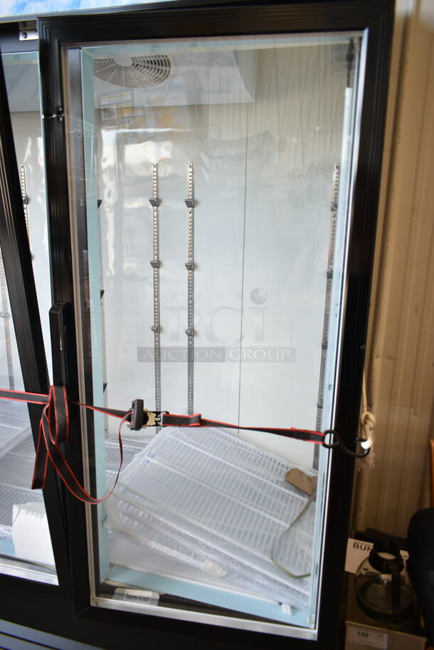 BRAND NEW SCRATCH AND DENT! 2023 Avantco 178GDC69HCB Metal Commercial 3 Door Reach In Cooler Merchandiser w/ Poly Coated Racks. 1 Door Needs To Be Reattached. 115 Volts, 1 Phase. Tested and Working! - Image 4 of 7