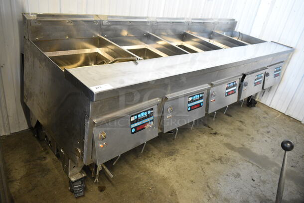 Ultrafryer PAP-2 Stainless Steel Commercial Floor Style Natural Gas Powered 4 Bay Deep Fat Fryer on Commercial Casters. 75,000 BTU.  - Image 1 of 11