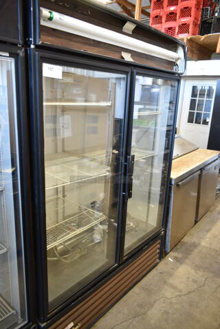 True GDM-49 Metal Commercial 2 Door Reach In Cooler Merchandiser w/ Poly Coated Racks. 115 Volts, 1 Phase. Cannot Test Due To Cut Power Cord