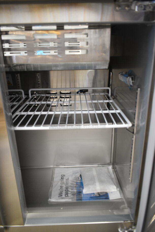 BRAND NEW SCRATCH AND DENT! 2023 Avantco 178SSCFT36HC Stainless Steel Commercial Prep Table on Commercial Casters. 115 Volts, 1 Phase. Tested and Powers On But Does Not Get Cold
 - Image 4 of 8