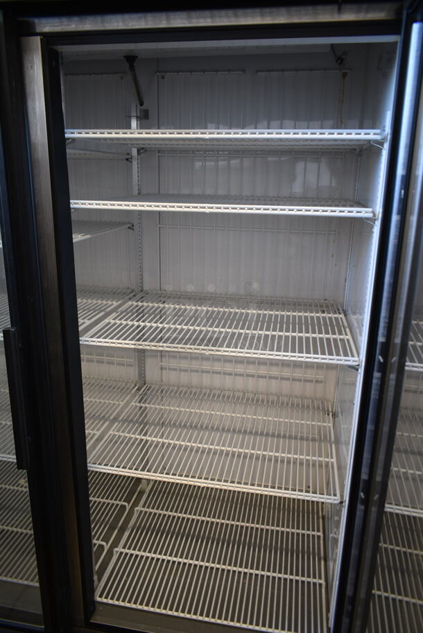 True GDM-49F-LD Metal Commercial 2 Door Reach In Freezer Merchandiser w/ Poly Coated Racks. 115/208-230 Volts, 1 Phase.  - Image 2 of 4