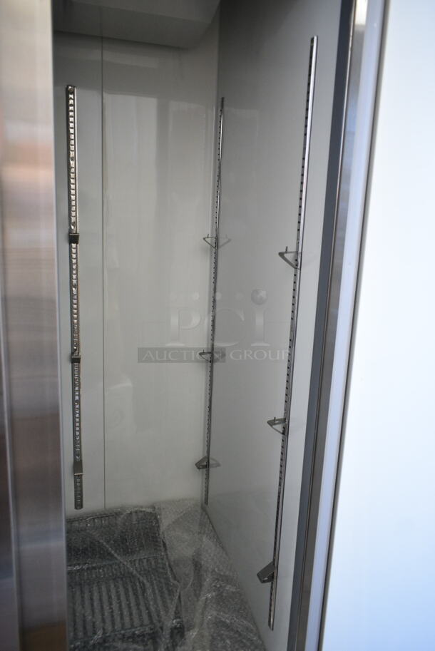 BRAND NEW SCRATCH AND DENT! 2023 Avantco 178A35FHC Stainless Steel Commercial 2 Door Reach In Freezer w/ Poly Coated Racks. Dent On Top Left. 115 Volts, 1 Phase. Tested and Working! - Image 6 of 8