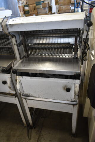 Oliver 777 Metal Commercial Floor Style Bread Loaf Slicer. 115 Volts, 1 Phase. Tested and Powers On But Parts Do Not Move