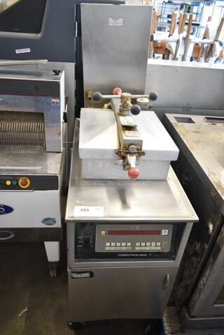 Henny Penny 500 Computron 8000 Stainless Steel Commercial Electric Powered Pressure Fryer w/ Filtration System on Commercial Casters. 480 Volts, 3 Phase.
