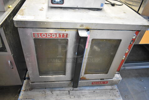 Blodgett Mark V Stainless Steel Commercial Electric Powered Full Size Convection Oven w/ View Through Doors, Metal Oven Racks and Thermostatic Controls. 208-240 Volts.