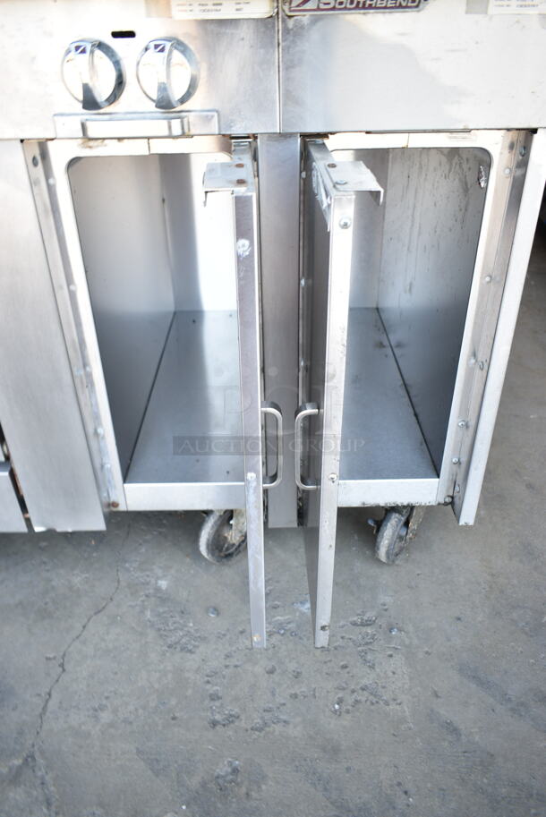 Southbend P48A-BBBB Stainless Steel Commercial Natural Gas Powered 8 Burner Range w/ Convection Oven, Side Counters and Back Splash on Commercial Casters.  - Image 7 of 10