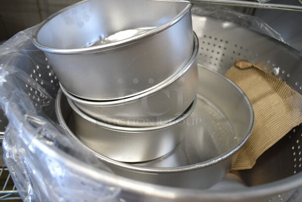 BRAND NEW SCRATCH AND DENT! Lot of 9 Various Items Including Town 34724 24" Hand Hammered Cantonese Wok, 554BP18FP1BASK Backyard Pro 18 Qt. Aluminum Fry Pot with 1 Fry Basket for Select Outdoor Ranges, Two 40716QTALMHB Choice 16 Qt. Aluminum Colander with Base and Handles, Baking Pans. - Image 7 of 9