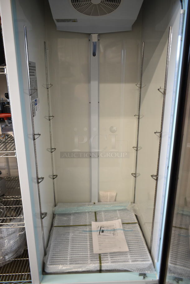 BRAND NEW SCRATCH AND DENT! 2023 Avantco 178GDC23HCW Metal Commercial Single Door Reach In Cooler Merchandiser w/ Poly Coated Racks on Commercial Casters. 115 Volts, 1 Phase. Tested and Working! - Image 5 of 6
