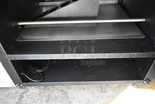 Black Metal Portable Bakery Donut Pastry Rack on Commercial Casters.  - Image 3 of 4