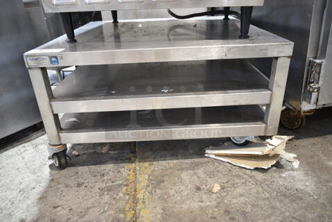 Stainless Steel Equipment Stand w/ 2 Under Shelves on Commercial Casters. 