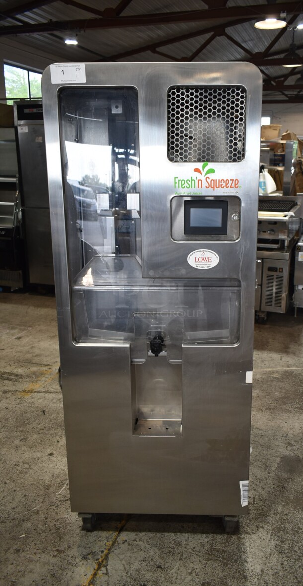 Fresh N Squeeze 2ND-GEN-MFJ-HE Stainless Steel Commercial Floor Style Citrus Juicer on Commercial Casters. 120 Volts, 1 Phase. Cannot Test; Powers On But Displays a Safety Circuit Fault Code - Image 1 of 5