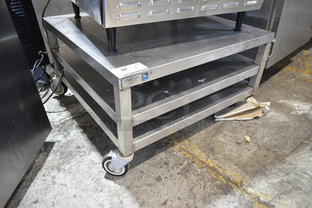 Stainless Steel Equipment Stand w/ 2 Under Shelves on Commercial Casters.  - Image 2 of 5