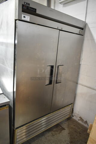 True T-49F Stainless Steel Commercial 2 Door Reach In Freezer w/ Poly Coated Racks. 115 Volts, 1 Phase. Tested and Powers On But Does Not Get Cold