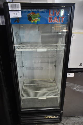True GDM-12 Metal Commercial Single Door Reach In Cooler Merchandiser w/ Poly Coated Racks. Tested and Powers On But Does Not Get Cold