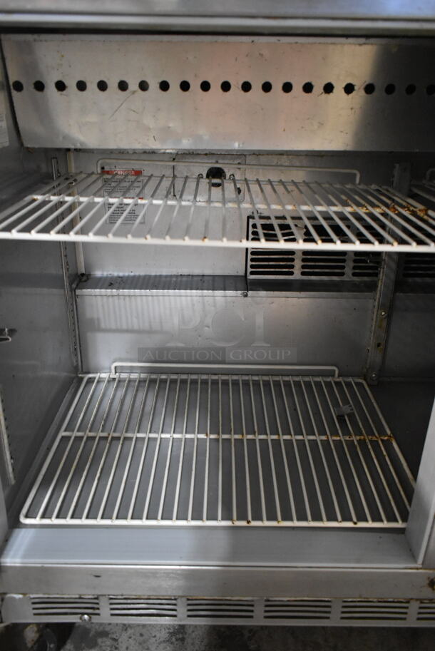 Beverage Air SPE48-12 Stainless Steel Commercial Sandwich Salad Prep Table Bain Marie Mega Top on Commercial Casters. 115 Volts, 1 Phase. Tested and Powers On But Does Not Get Cold - Image 3 of 5