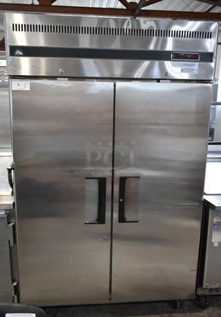 Everest ESR2 Stainless Steel Commercial 2 Door Reach In Cooler w/ Poly Coated Racks on Commercial Casters. 115 Volts, 1 Phase. Tested and Working!