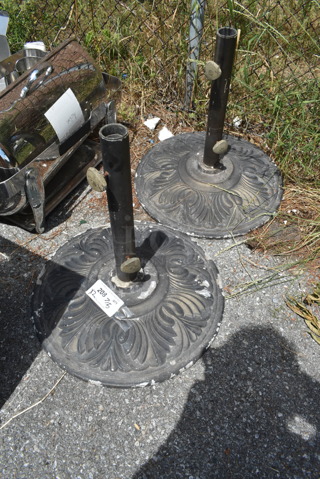 2 Black Metal Patio Umbrella Bases. 2 Times Your Bid!