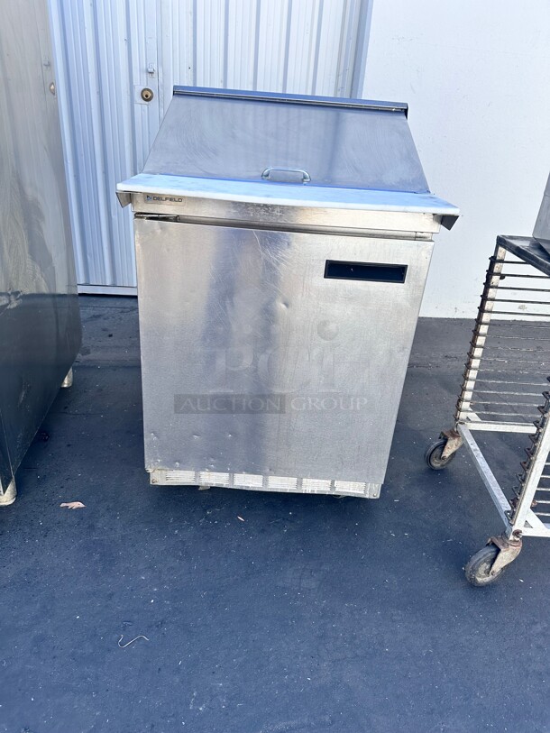 Used Delfield 4427NP-12M 27 inch 1 Door Mega Top Front Breathing Refrigerated Sandwich Prep Table with Casters - Image 5 of 5